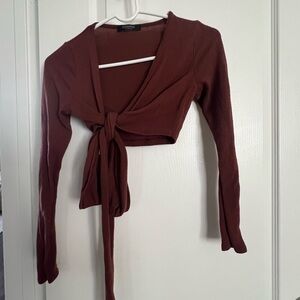 Reddish orange tie up long sleeve crop top